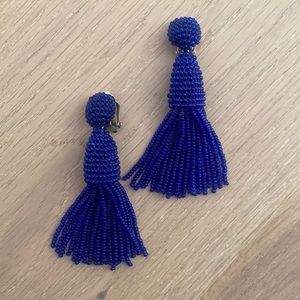 Blue tassel clip on earrings.